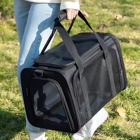sac de transport porté grâce aux poignées
